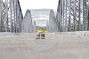 Baby shoes with yellow flowers