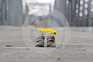 Baby shoes with yellow flowers