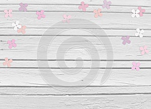 Baby shower, birthday day or wedding mockup scene with white wooden background, floral paper lilac or hydrangea confetti