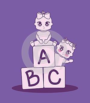 Baby shower card with girls and alphabet blocks