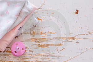 Baby shower concept - child essencials on wood background