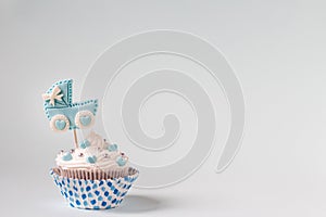 Baby shower cupcake for a boy. Newborn announcement concept. Text space