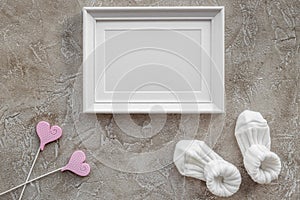 baby shower decoration for birth of child celebration on gray background top view mock up