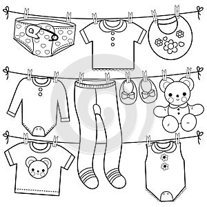 Baby shower gifts and accessories. Baby girl and boy clothes hanging on clothes line. Vector black and white coloring page