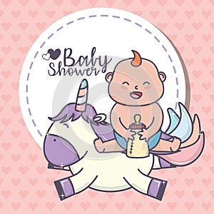 Baby shower little girl with bottle milk and cute unicorn