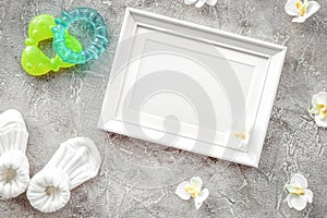 Baby shower modern design with frame on gray stone background to