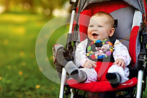 Baby in sitting stroller