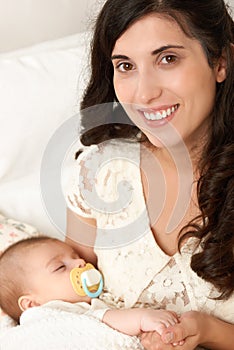 Baby sleep in mother hand, happy maternity concept