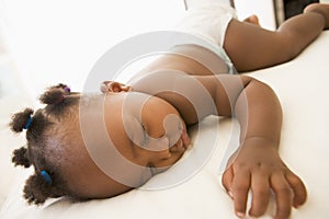 Baby sleeping in bedroom