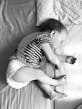 Baby sleeping black and white