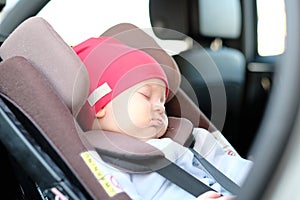 Baby sleeping in car seat