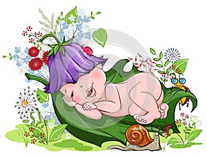 Baby sleeping peacefully on the lawn of flowers