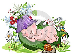 Baby sleeping peacefully on the lawn of flowers photo