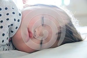 Baby sleeping portrait close up, health care. Little girl sleep cute