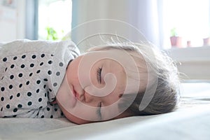 Baby sleeping portrait close up, health care. Little girl sleep cute