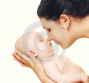 Baby sleeping sweetly on mother's arms