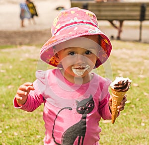 Baby smeared with ice cream