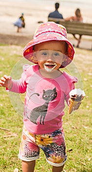 Baby smeared with ice cream
