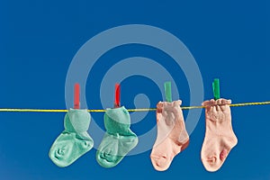 Baby socks on laundry line to dry