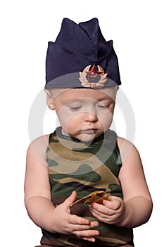 baby soldiers in military uniform is isolated on a white background. Boy in uniform of the Soviet soldier.