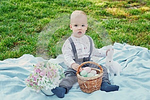 Baby son for Easter in the park