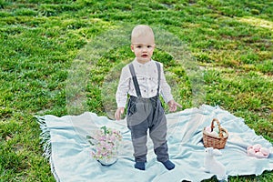 Baby son for Easter in the parkhe frame