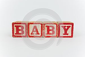 Baby Spelled in Blocks on a White Background