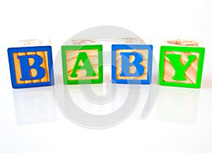 BABY spelled in wooden blocks