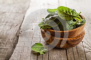 Baby spinach leaves in bowl