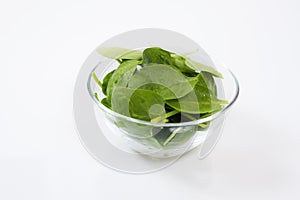 Baby spinach leaves in the glass bowl