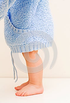 Baby standing on white background