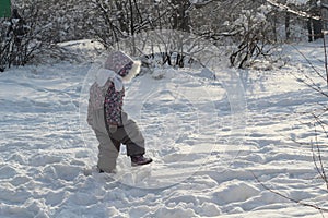 Baby step against snow forest winter oudoors