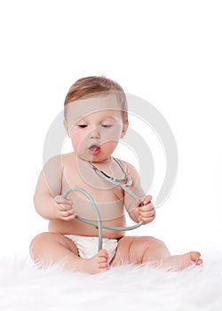 Baby with stethoscope.