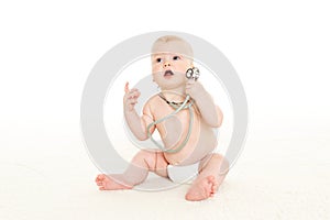 Baby with stethoscope.