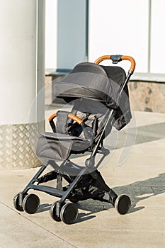 Baby stroller standing on the street, new design.