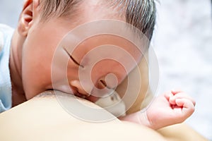 Baby Sucking from mother`s breast. Breastfeeding concept. breastfeeding and infant.