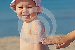Baby sunscreen cream. photo