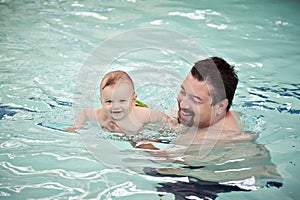 Baby swimming dad pool