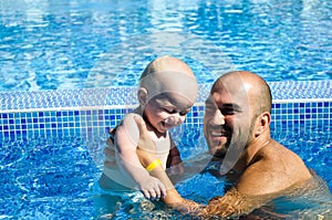 Baby at swimming pool