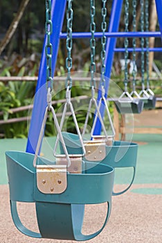 Baby swing set at the playground.