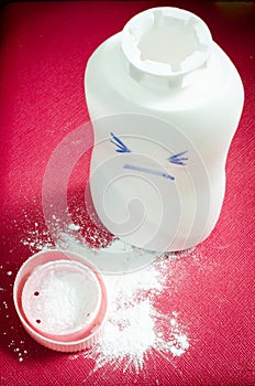 Baby talcum powder container.