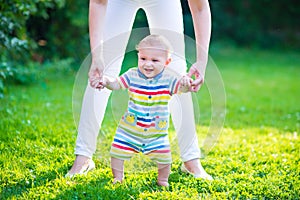 Baby talking his first steps