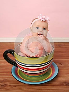 Baby in a tea cup