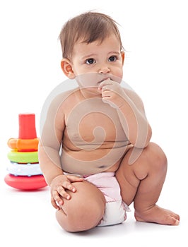 Baby with thoughtful expression in her face.