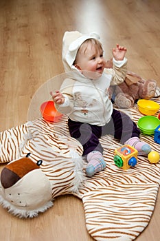 Baby on tiger mat