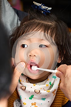 Baby toddler brushing teeth before sleep