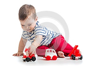Baby toddler playing with toy car