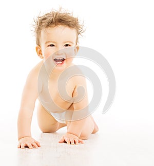 Baby with tousled hairs, active boy in diaper photo