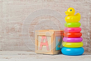 Baby toys on wooden table. Child development