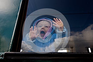 Baby in train window